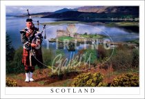 Piper above Eilean Donan Castle, Scotland Postcard (H SG)